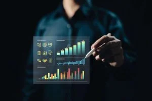 Forex charts and trading analysis on screen.